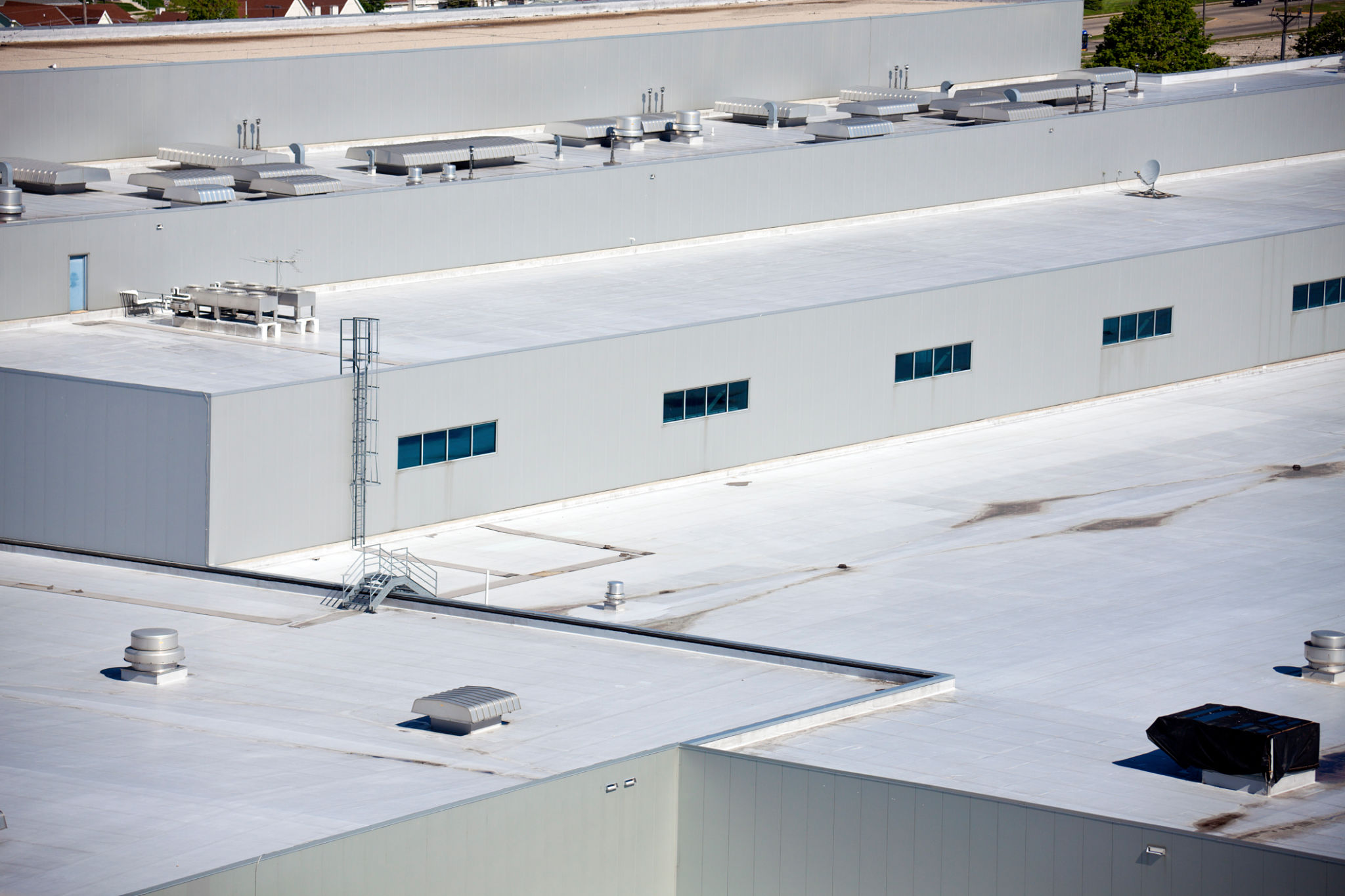 Close-up of the roof of big warehouse building Close-up of the roof of big warehouse building