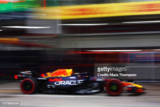 Max Verstappen of the Netherlands driving the Oracle Red Bull Racing RB19 in the Pitlane during qualifying ahead of the F1 Grand Prix of Brazil at...