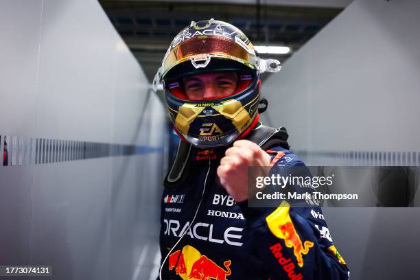 Pole position qualifier Max Verstappen of the Netherlands and Oracle Red Bull Racing celebrates in the garage during qualifying ahead of the F1 Grand...