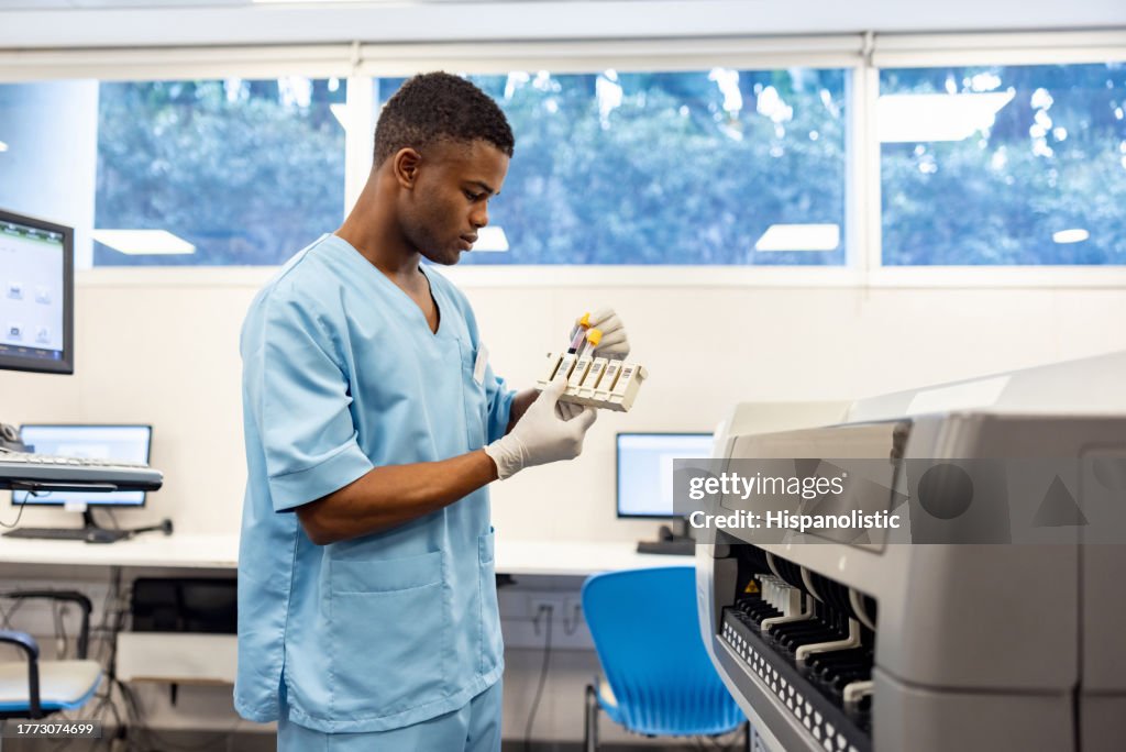 Pathologist Definition Pathologist Working At The Laboratory Analyzing Blood Samples High-Res ...