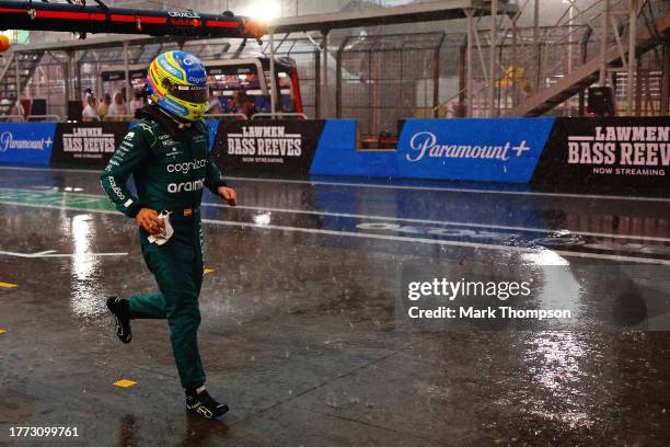 Fourth placed qualifier Fernando Alonso of Spain and Aston Martin F1 Team runs in the pitlane afterg qualifying ahead of the F1 Grand Prix of Brazil...