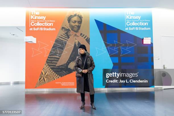 Inglewood, CA Victoria Rowell, a collector of African American art, stops to admire The Kinsey African American Art & History Collection's exhibit,...