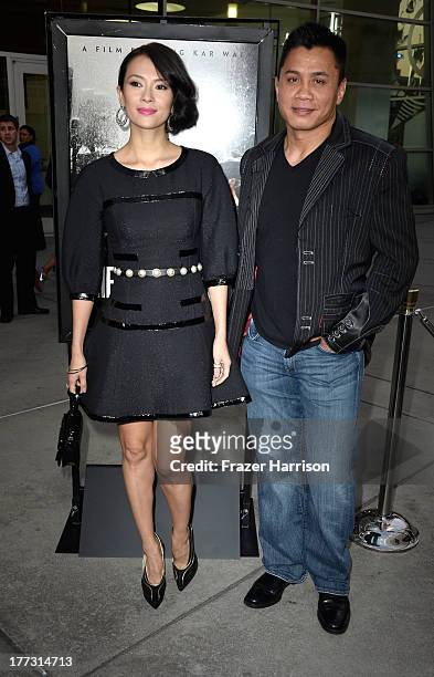 Actress Ziyi Zhang, and actor Cung Le, arrive at the Screening Of The Weinstein Company And Annapurna Pictures' "The Grandmaster" at ArcLight Cinemas...