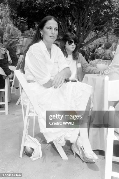 Guests attend an event, benefitting the Santa Monica Hospital Rape Treatment Center, at the Beverly Hills, California, estate of Kenny and Marianne...