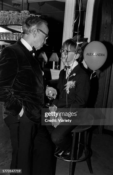 Arthur M. Schlesinger Jr. And guest attend a party at Le Club in New York City on April 24, 1984.