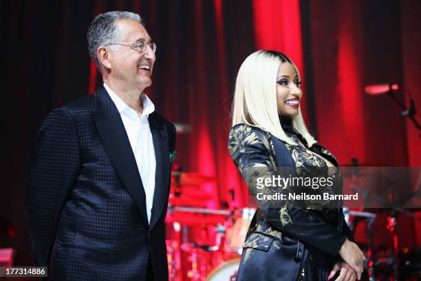 President and CEO Del Bryant and Nicki Minaj speak onstage at the 2013 BMI R&B/Hip-Hop Awards at Hammerstein Ballroom on August 22, 2013 in New York...