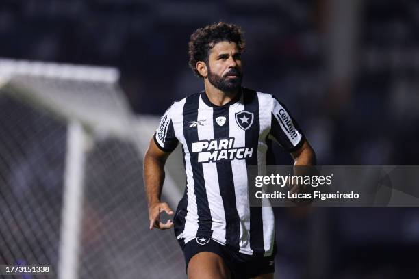 Diego Costa of Botafogo celebrates after scoring the team's first goal during the match between Botafogo and Gremio as part of Brasileirao 2023 at...