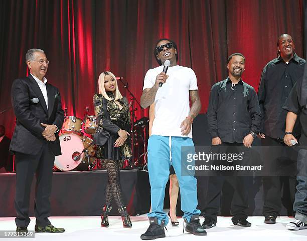President and CEO Del Bryant, Nicki Minaj, Lil Wayne, Juvenile and Slim Williams speak onstage at the 2013 BMI R&B/Hip-Hop Awards at Hammerstein...