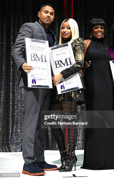 Nicki Minaj and BMI Vice President Catherine Brewton onstage at the 2013 BMI R&B/Hip-Hop Awards at Hammerstein Ballroom on August 22, 2013 in New...