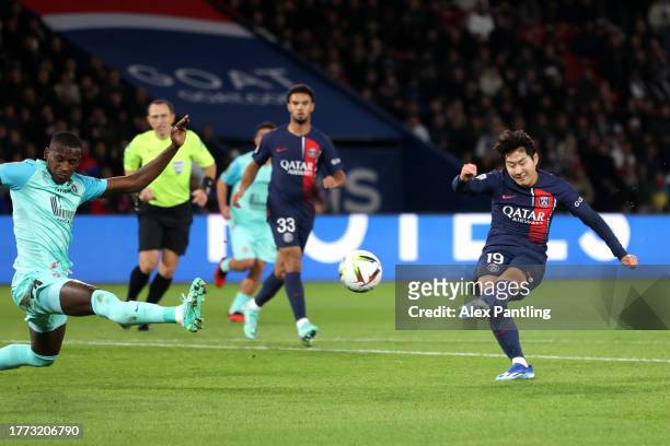 Lee Kang-In of PSG scores his sides first goal during the Ligue 1 Uber Eats match between Paris Saint-Germain and Montpellier HSC at Parc des Princes...