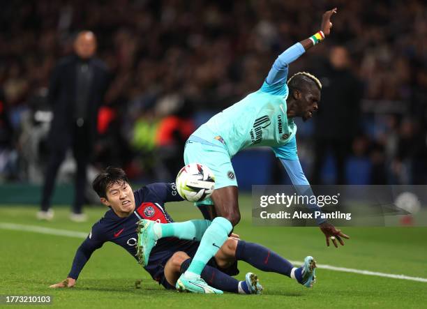 Lee Kang-In of PSG makes a tackle during the Ligue 1 Uber Eats match between Paris Saint-Germain and Montpellier HSC at Parc des Princes on November...