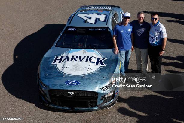 Retiring NASCAR Cup Series driver, Kevin Harvick, NASCAR Hall of Famer, Dale Earnhardt Jr. And crew chief Rodney Childers pose for a special photo to...