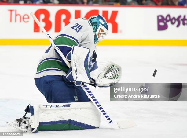 Casey DeSmith of the Vancouver Canucks makes a save against the Ottawa Senators at Canadian Tire Centre on November 9, 2023 in Ottawa, Ontario,...