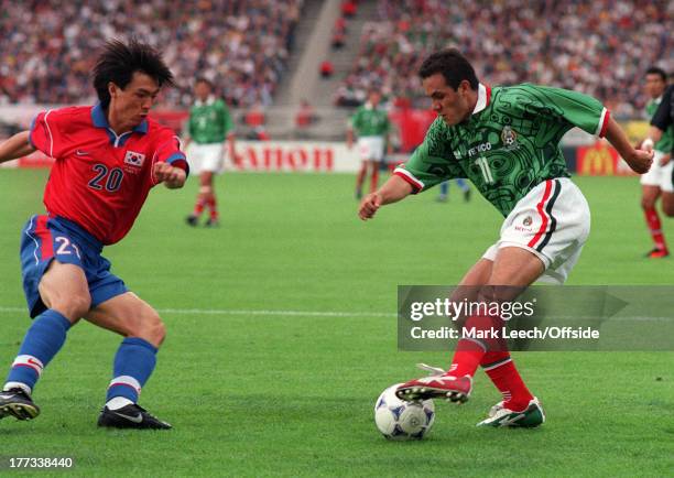 Football World Cup 1998, South Korea v Mexico, Cuauhtemoc Blanco runs at Hong Myung Bo.