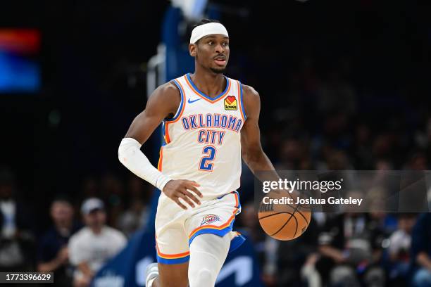 Shai Gilgeous-Alexander of the Oklahoma City Thunder handles the ball during the second half against the New Orleans Pelicans at Paycom Center on...