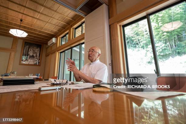 This photo taken on September 5, 2023 shows chief Buddhist priest Eiichi Shinohara speaking during an interview with AFP at his temple near the city...