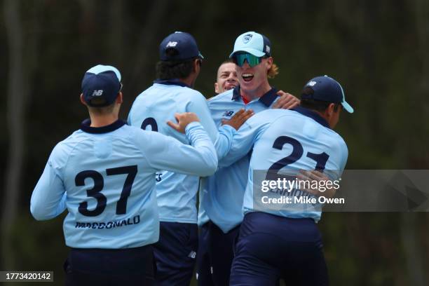 Jack Nisbet of New South Wales celebrates with teammates after running out Cameron Bancroft of Western Australia during the Marsh One Day Cup match...