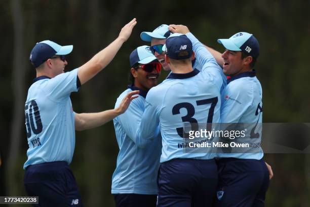 Jack Nisbet of New South Wales celebrates with teammates after running out Cameron Bancroft of Western Australia during the Marsh One Day Cup match...
