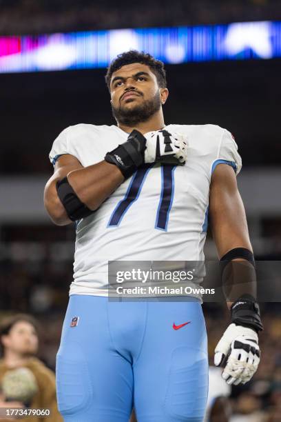 Andre Dillard of the Tennessee Titans looks on during the national anthem prior to an NFL football game between the Pittsburgh Steelers and the...