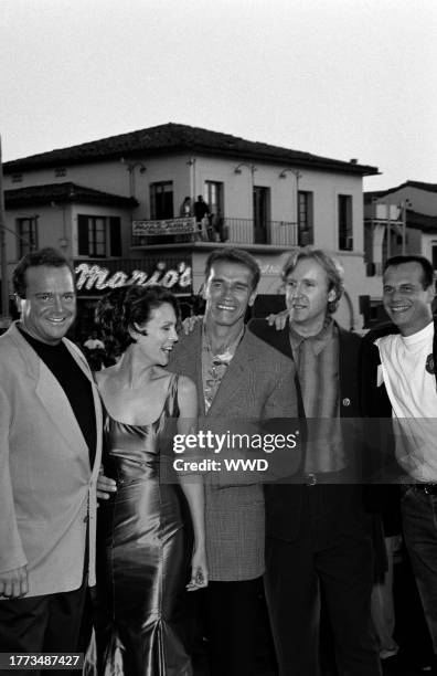 Tom Arnold, Jamie Lee Curtis, Arnold Schwarzenegger, James Cameron, and Bill Paxton attend the premiere of "True Lies" in Westwood, California, on...