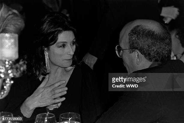 Anouk Aimee and guest attend an event at the Fairmont Hotel in Dallas, Texas, on November 7, 1984.