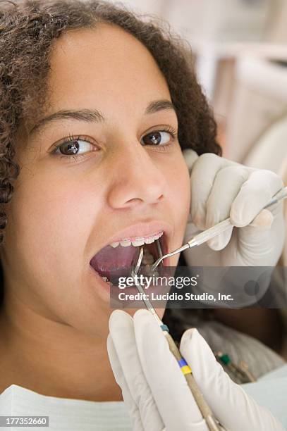 Teenage Girl Having A Dental Exam, Foto de stock