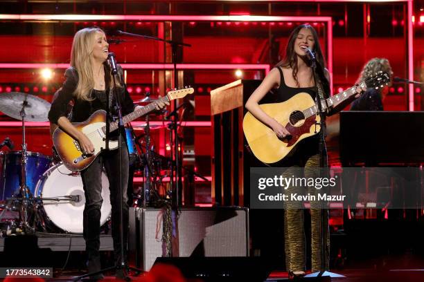 Sheryl Crow and Olivia Rodrigo perform onstage during the 38th Annual Rock & Roll Hall Of Fame Induction Ceremony at Barclays Center on November 03,...