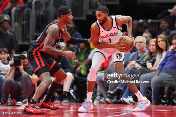 Mikal Bridges of the Brooklyn Nets is defended by Torrey Craig of the Chicago Bulls in the first half of the NBA In-Season Tournament at the United...