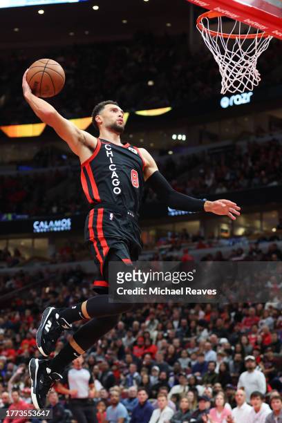 Zach LaVine of the Chicago Bulls dunks against the Brooklyn Nets in the first half of the NBA In-Season Tournament at the United Center on November...