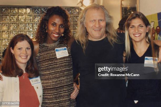 Alpine ski racer Picabo Street, Los Angeles Sparks player Lisa Leslie, Joe Pytka and volleyball player Gabrielle Reece take a break from filming on...