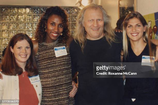 Alpine ski racer Picabo Street, Los Angeles Sparks player Lisa Leslie, Joe Pytka and volleyball player Gabrielle Reece take a break from filming on...