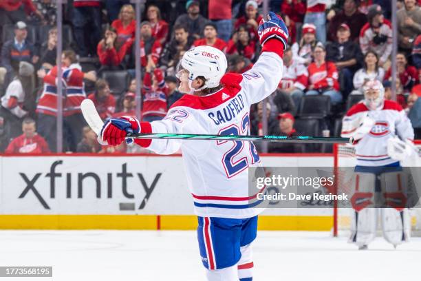 Cole Caufield of the Montreal Canadiens scores the game winning goal in O.T. Against the Detroit Red Wings at Little Caesars Arena on November 9,...