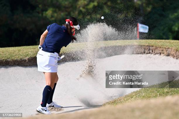 Yui Kawamoto of Japan hits out from a bunker on the 2nd hole during the final round of Meiji Yasuda Ladies Open Golf Tournament at Ibaraki Kokusai...