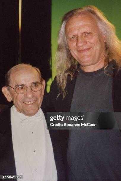 Yogi Berra and Joe Pytka take a break on the set of the "New York Miracle" commercial in front of a green screen on November 27, 2001 in New York,...