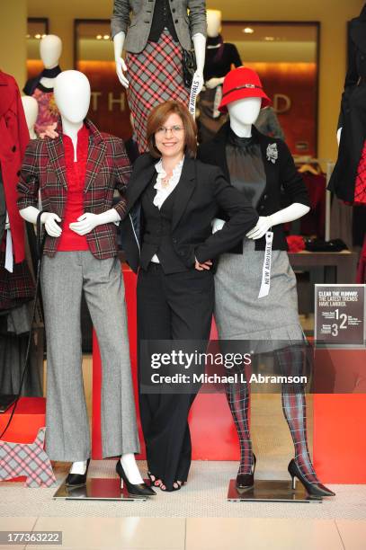 Portrait of Linda Heasley, CEO of Lane Bryant and former chief of the Limited, posing with mannequins, September 3, 2008.