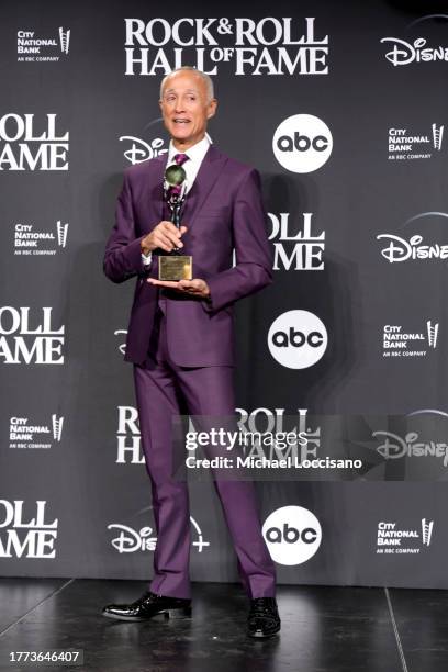 Presenter Andrew Ridgeley poses in the press room during the 38th Annual Rock & Roll Hall Of Fame Induction Ceremony at Barclays Center on November...