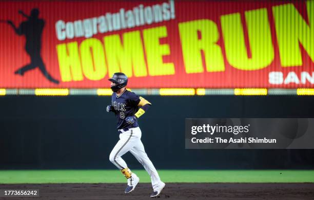 Marwin Gonzalez of the Orix Buffaloes rounds bases after hitting a solo home run in the 4th inning against Hanshin Tigers during the Japan Series...