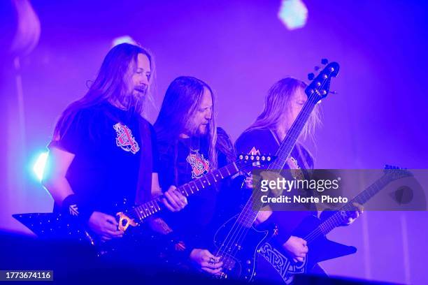 Johan Söderberg, Ted Lundström and Olavi Mikkonen of Amon Amarth perform during a show as part of Hell & Heaven 2023 at Foro Pegaso on November 3,...