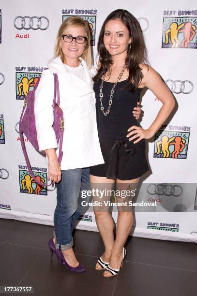 Actresses Maureen McCormick and Danica McKellar attend the Best Buddies poker event at Audi Beverly Hills on August 22, 2013 in Beverly Hills,...