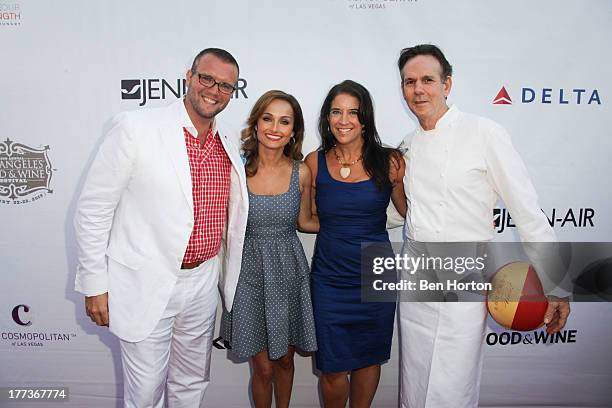 Dave Bernahl, Giada de Laurentiis a guest and Thomas Keller attend the Festa Italiana with Giada de Laurentiis opening night celebration of the third...