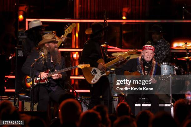 Chris Stapleton and Willie Nelson perform onstage during the 38th Annual Rock & Roll Hall Of Fame Induction Ceremony at Barclays Center on November...