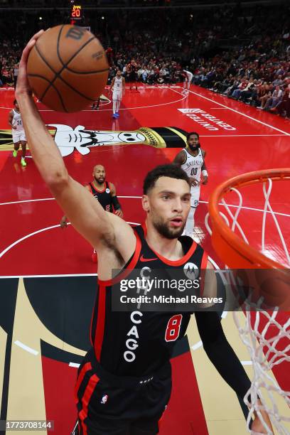 Zach LaVine of the Chicago Bulls dunks against the Brooklyn Nets in the first half of the NBA In-Season Tournament at the United Center on November...