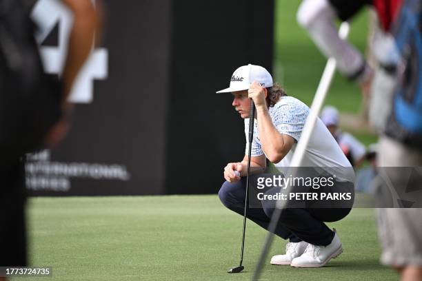 Cam Smith of Australia lines up a putt on day two of the Hong Kong Open at Fanling golf club in Hong Kong on November 10, 2023.
