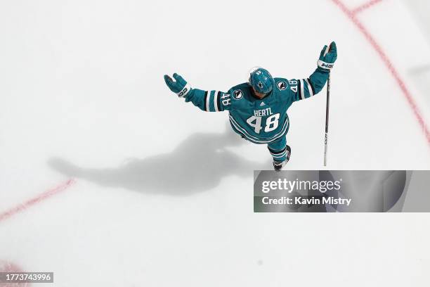 An overhead view as Tomas Hertl of the San Jose Sharks celebrates scoring a goal against the Edmonton Oilers at SAP Center on November 9, 2023 in San...