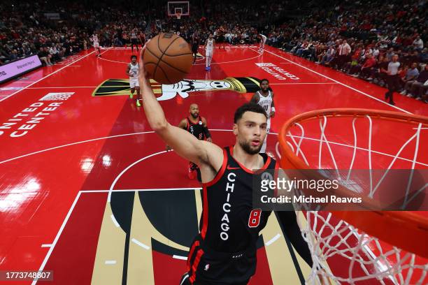 Zach LaVine of the Chicago Bulls dunks against the Brooklyn Nets in the first half of the NBA In-Season Tournament at the United Center on November...