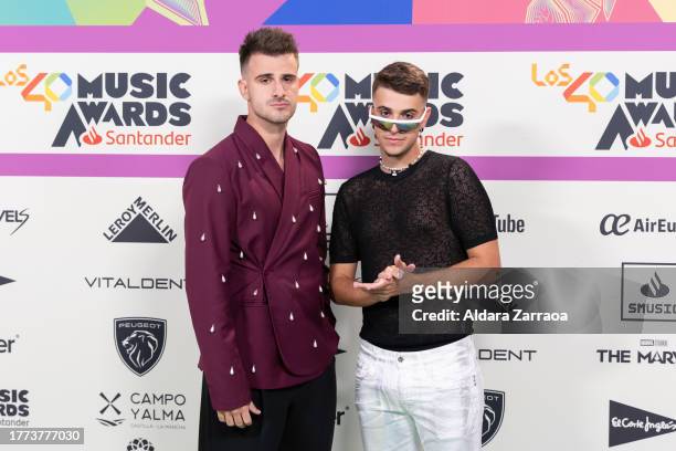 Adexe and Nau attend the "LOS40 Music Awards Santander 2023" photocall at WiZink Center on November 03, 2023 in Madrid, Spain.