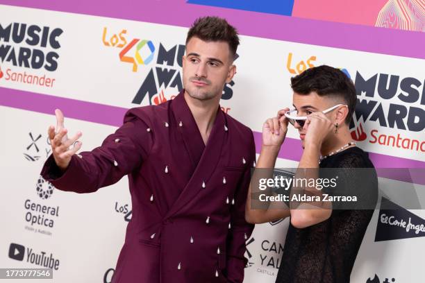 Adexe and Nau attend the "LOS40 Music Awards Santander 2023" photocall at WiZink Center on November 03, 2023 in Madrid, Spain.