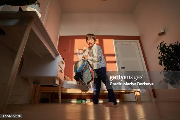 the korean boy angrily swings his backpack to throw it. failures at school. - last day of school stock pictures, royalty-free photos & images