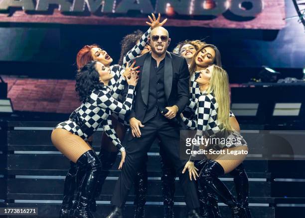 Pitbull performs in support of The Trilogy Tour at Little Caesars Arena on November 03, 2023 in Detroit, Michigan.