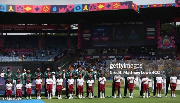 Players of Pakistan line up for the National Anthems ahead of the ICC Men's Cricket World Cup India 2023 between New Zealand and Pakistan at M....